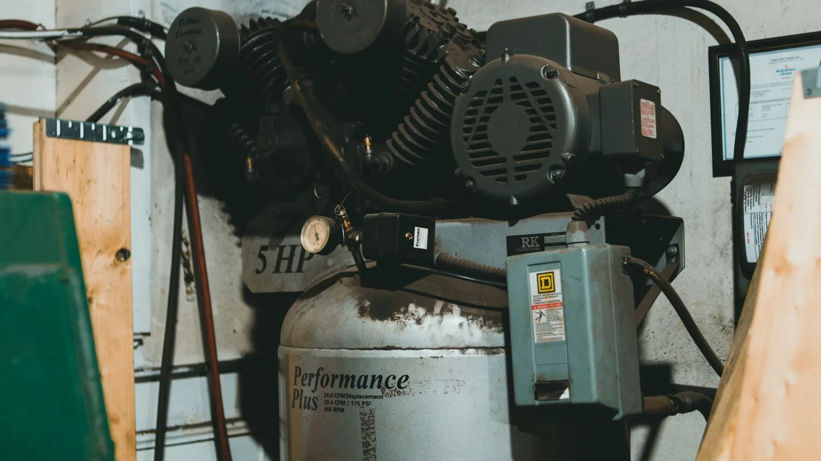 Close-up of a large industrial air compressor pump