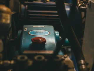 Close-up of a blue industrial engine and its controls