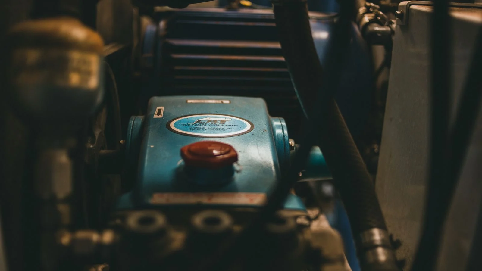 Close-up of a blue industrial engine and its controls