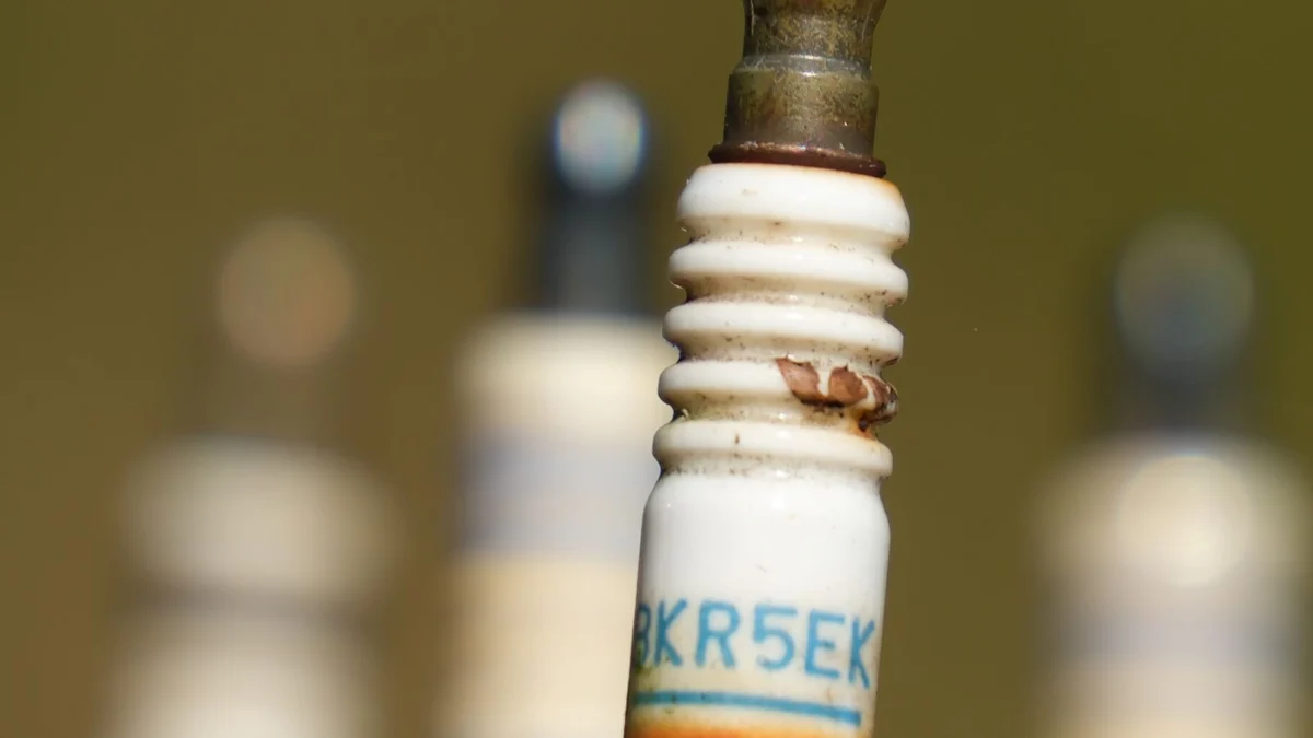 Close-up of worn spark plugs