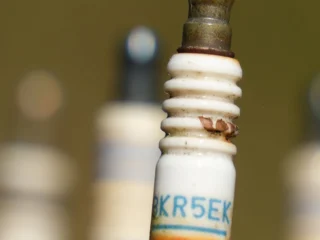 Close-up of worn spark plugs